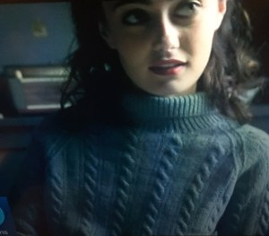 Ella Purnell as Hester Argyll in Ordeal by Innocence (BBC 2018) wearing long, oversized,cabled jumper/sweater.