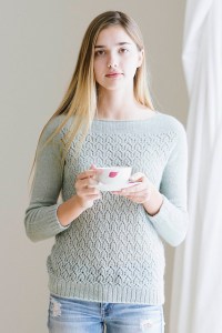Knitted sweater with all-over lace body. Knitting pattern: April by Isabell Kraemer