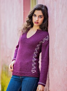 Sweater inspired by traditional “poveiras” sweaters with embroidery detail, designed by Filipa Carneiro.