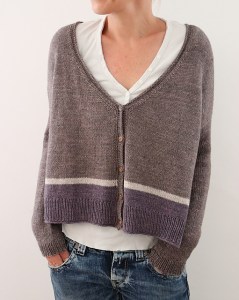 Boxy, cropped cardigan with stripe detail, designed by Isabel Kraemer.