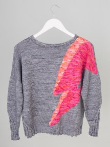 Oversized sweater with lighting bolt motif in intarsia, designed by Sue Stratford.